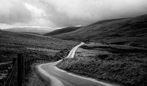 Preview wallpaper road, hills, meadow, valley, black and white