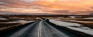 Preview wallpaper road, horizon, markup, turn, snow, sunset