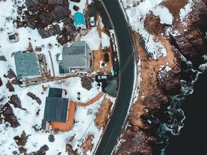 Preview wallpaper road, houses, roofs, aerial view