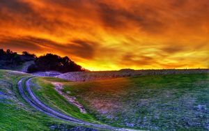 Preview wallpaper road, lifting, field, evening