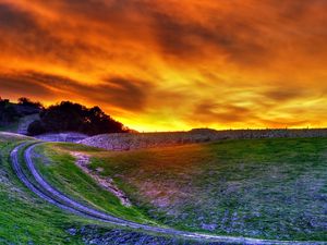 Preview wallpaper road, lifting, field, evening