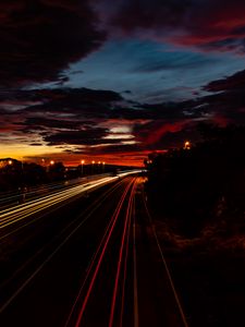 Preview wallpaper road, light, long exposure, trees, sunset, dark