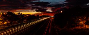 Preview wallpaper road, light, long exposure, trees, sunset, dark