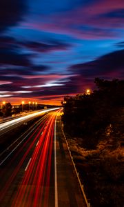 Preview wallpaper road, light, long exposure, trees, sunset