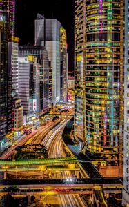 Preview wallpaper road, lights, buildings, freezelight, city, night