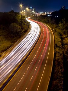 Preview wallpaper road, lights, freezelight, night, city, trees