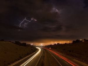 Preview wallpaper road, lights, lightning, clouds, night, freezelight