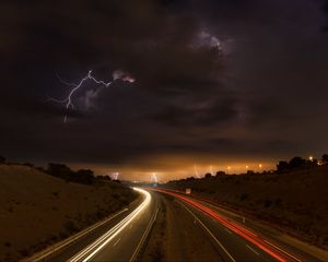 Preview wallpaper road, lights, lightning, clouds, night, freezelight