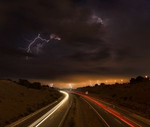 Preview wallpaper road, lights, lightning, clouds, night, freezelight