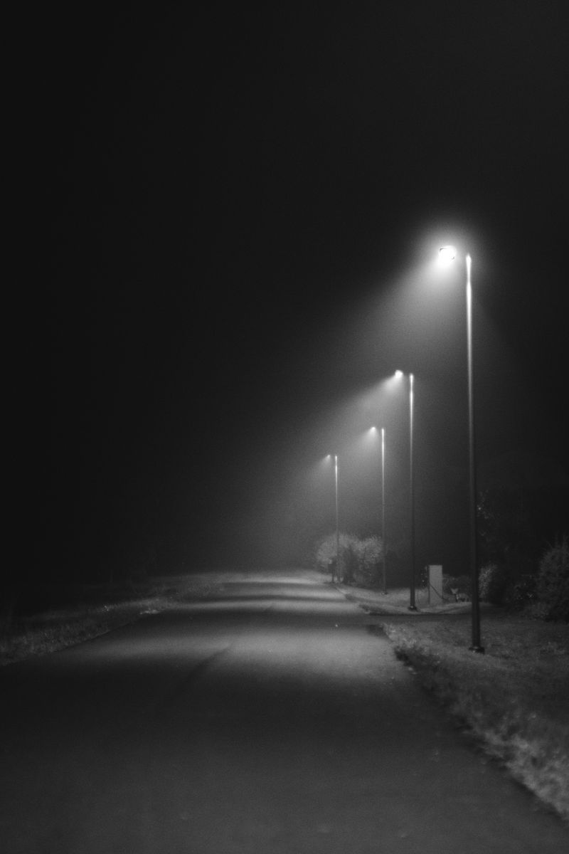 800x1200 Wallpaper road, lights, street, dark, bw, night