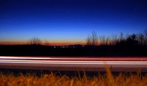 Preview wallpaper road, line, lines, grass, evening