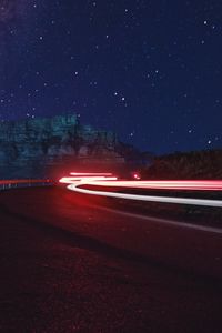 Preview wallpaper road, long exposure, glow, starry sky, stars