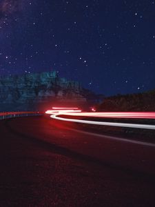 Preview wallpaper road, long exposure, glow, starry sky, stars