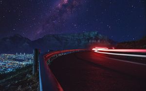 Preview wallpaper road, long exposure, glow, starry sky, stars