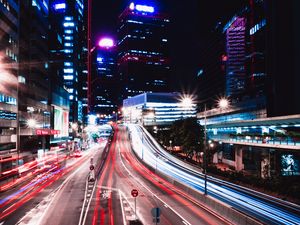 Preview wallpaper road, long exposure, lights, buildings, city