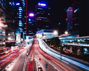 Preview wallpaper road, long exposure, lights, buildings, city