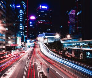 Preview wallpaper road, long exposure, lights, buildings, city