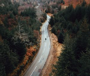 Preview wallpaper road, man, alone, aerial view