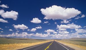 Preview wallpaper road, marking, asphalt, line, yellow, strip, clouds, roadside