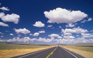 Preview wallpaper road, marking, asphalt, line, yellow, strip, clouds, roadside