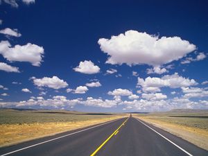 Preview wallpaper road, marking, asphalt, line, yellow, strip, clouds, roadside
