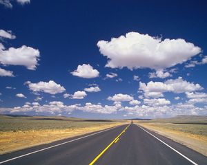 Preview wallpaper road, marking, asphalt, line, yellow, strip, clouds, roadside