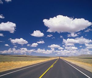 Preview wallpaper road, marking, asphalt, line, yellow, strip, clouds, roadside