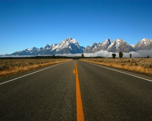 Preview wallpaper road, marking, line, yellow, mountains, fog, asphalt