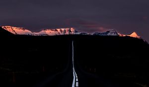 Preview wallpaper road, marking, mountains, horizon, dark, night, sunset