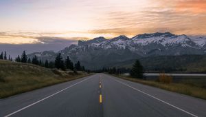 Preview wallpaper road, marking, mountains, snowy, distance