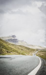 Preview wallpaper road, marking, rocks, sky