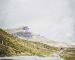Preview wallpaper road, marking, rocks, sky