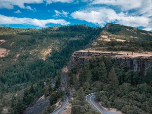 Preview wallpaper road, marking, rocks, trees, forest