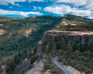 Preview wallpaper road, marking, rocks, trees, forest