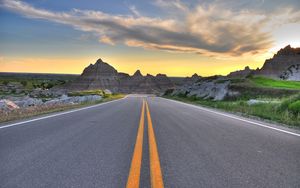 Preview wallpaper road, marking, rocks, mountains, sky