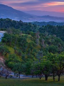 Preview wallpaper road, mountain, asphalt, relief, evening, decline, trees, look