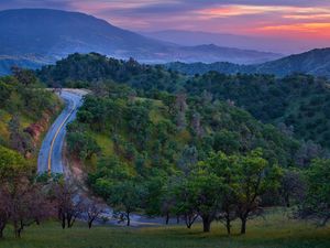 Preview wallpaper road, mountain, asphalt, relief, evening, decline, trees, look