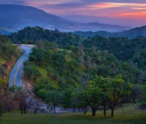 Preview wallpaper road, mountain, asphalt, relief, evening, decline, trees, look