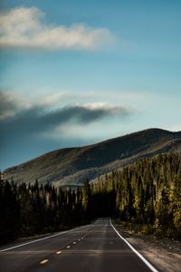Preview wallpaper road, mountain, forest, direction, marking, sky