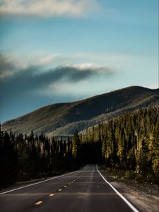 Preview wallpaper road, mountain, forest, direction, marking, sky