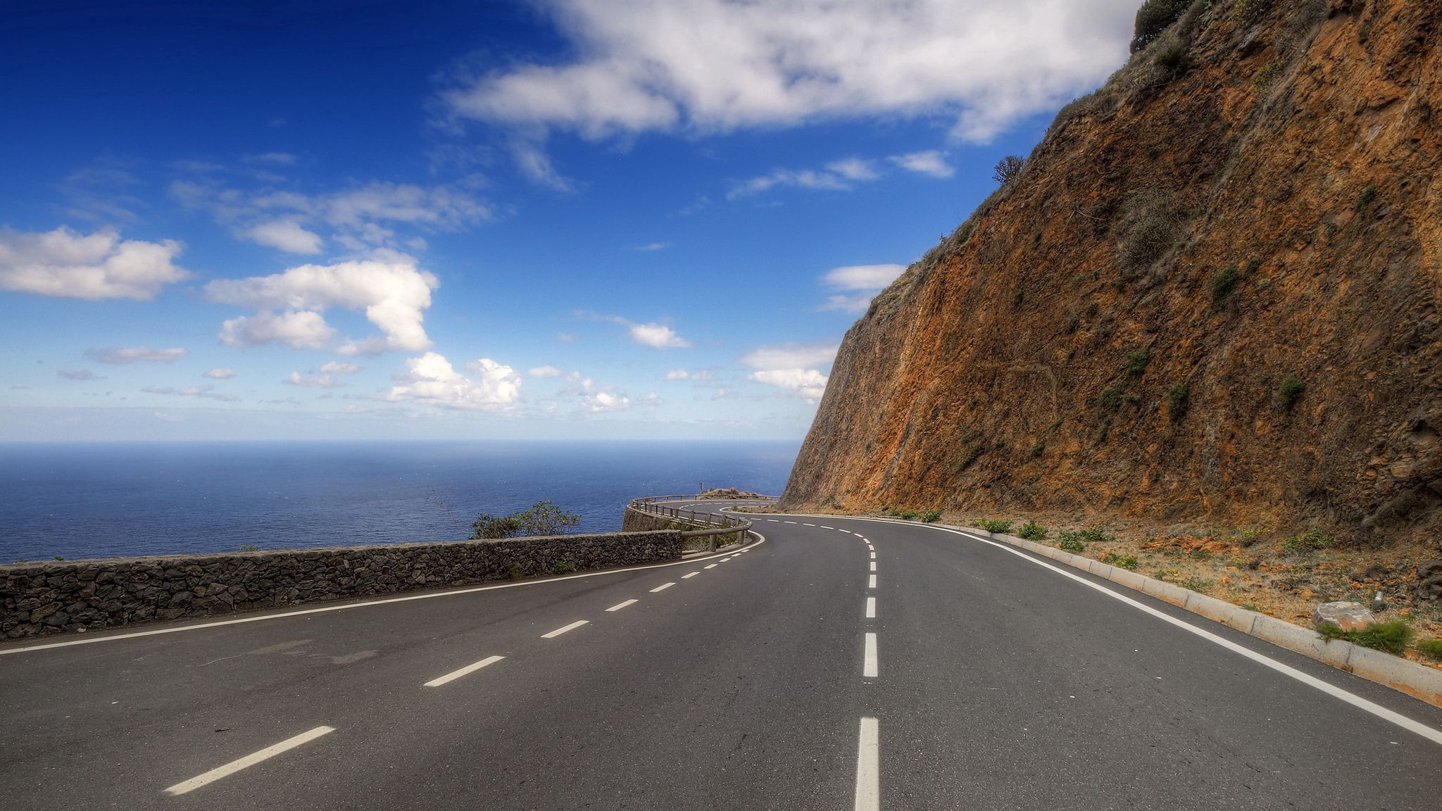 Download wallpaper 2048x1152 road, mountain, hill, mark, turn, mountain