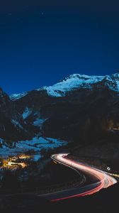 Preview wallpaper road, mountain, night, lights, snow, dark