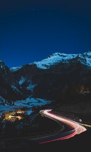 Preview wallpaper road, mountain, night, lights, snow, dark