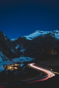 Preview wallpaper road, mountain, night, lights, snow, dark
