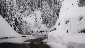 Preview wallpaper road, mountain, snow, trees, slope, winter