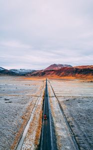 Preview wallpaper road, mountains, aerial view, desert, plateau