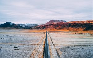 Preview wallpaper road, mountains, aerial view, desert, plateau