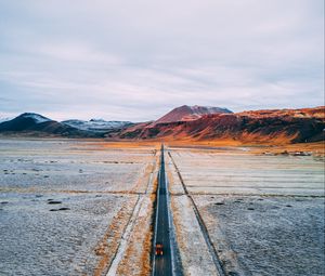 Preview wallpaper road, mountains, aerial view, desert, plateau