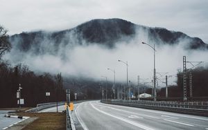 Preview wallpaper road, mountains, clouds, landscape