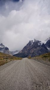 Preview wallpaper road, mountains, distance, snow, snowy